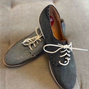 Rollie Women's Derby lace-up flat oxfords in a black and white polka dot print